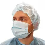 Elasticized surgical face mask
